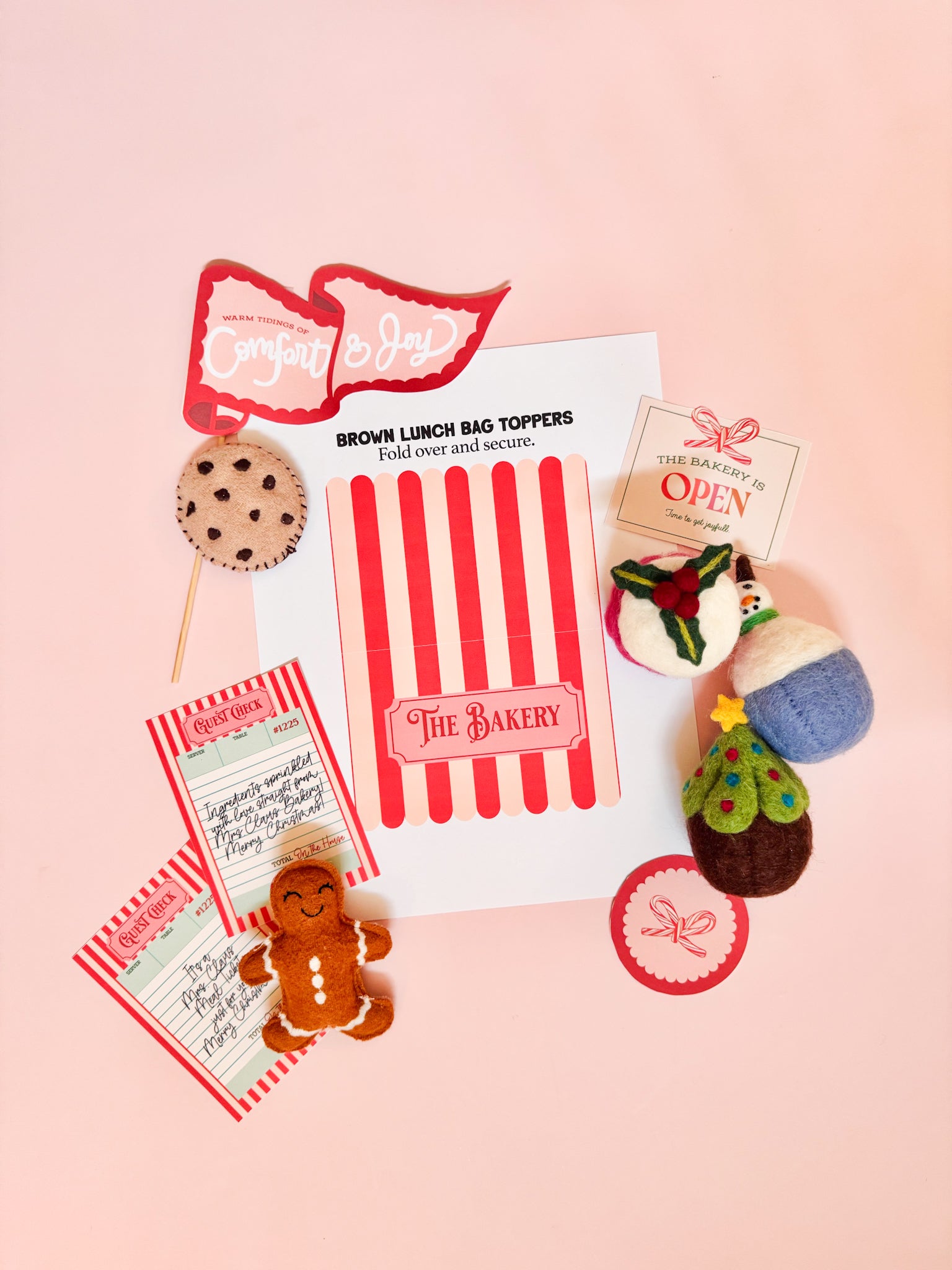 Collection of Mrs. Claus style bakery-themed items on a pink background